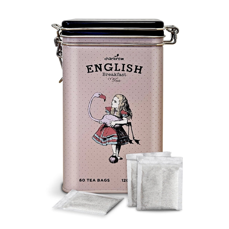 blik English Breakfast Tea roze op witte achtergrond met losse theezakjes