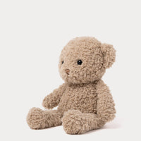 Teddybeer bruin van de zijkant gefotografeerd