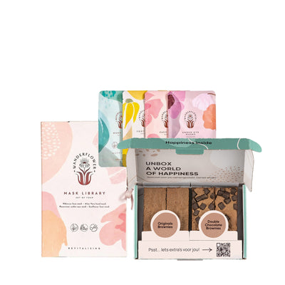 Een giftpack met daarin 4 verschillende maskers en een brownie box.