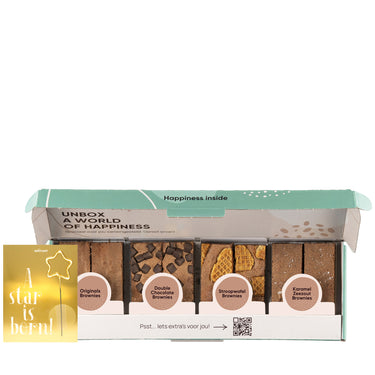 Wondercard met een sterretje in een vorm van een sterretje dat kan branden en een brownie box met 8 brownies.
