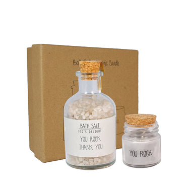 badzout met kaarsje op witte achtergrond